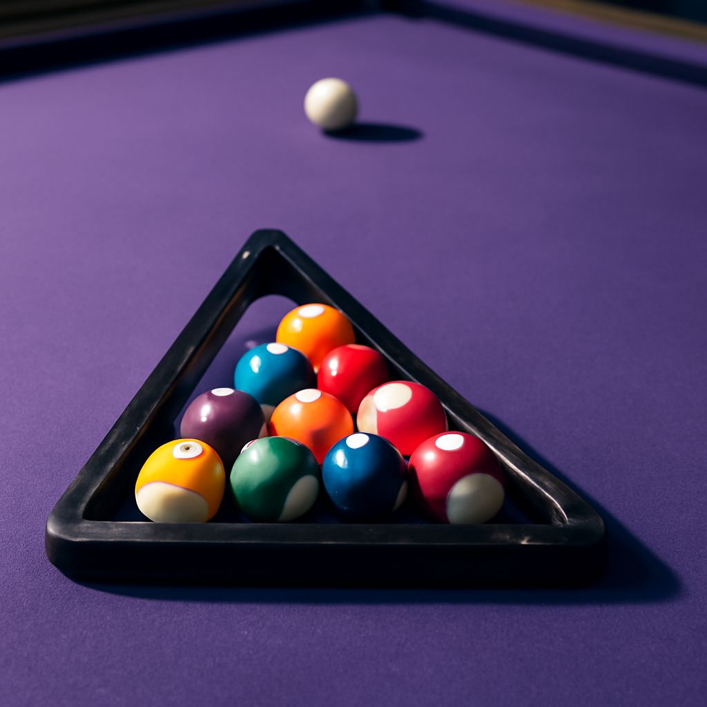 Pool table setup with black and white outdoor pillows and peephole camera